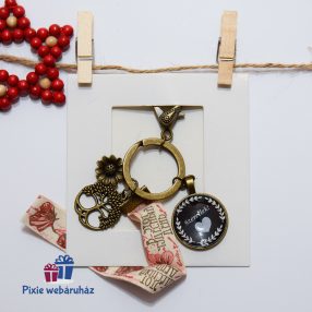   Természetkedvelőnek antik bronz színű táskadísz képtartós kerek medállal