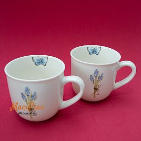   Porcelán teás vagy kávés bögre gyöngyike és kék lepke mintával JET márka