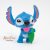 Lilo és Stich a csillagkutya levelet tartó Stich figura 
