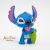 Lilo és Stich a csillagkutya levelet tartó Stich figura 