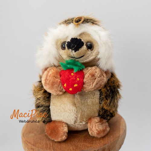 Plüss sün, süni eperrel a kezében