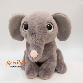 Szürke plüss ülő elefánt csillogó nagy szemekkel