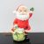 Mikulás puttony ajándékkal porcelánból készült karácsonyi dísztárgy, dekoráció 