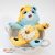 Mc donalds plüss figura, maci 2025 (kék-sárga) Gondos Bocsok (Care Bears) karakterek patchwork, azaz foltvarrás stílusú Halloweeni kiadás "Scare Bears" (Ijesztő bocs)