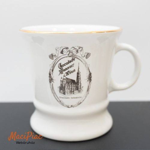 Vintage porcelán bögre, amelyen a híres osztrák édességgyártó, a Manner logója és egy bécsi látkép látható