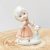 Porcelán kislány cicával nipp, dekoráció, szobor Peach Elegance Giftcraft márkájú