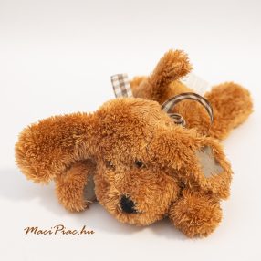   Plüss foltos hasaló kutya kockás masnival a nyakában, nagyon helyes